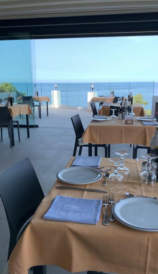 Hotel L'Oasi Кала Гононе Екстериор снимка