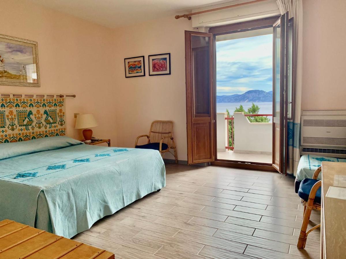 Hotel L'Oasi Кала Гононе Екстериор снимка