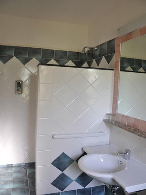 Hotel L'Oasi Кала Гононе Стая снимка