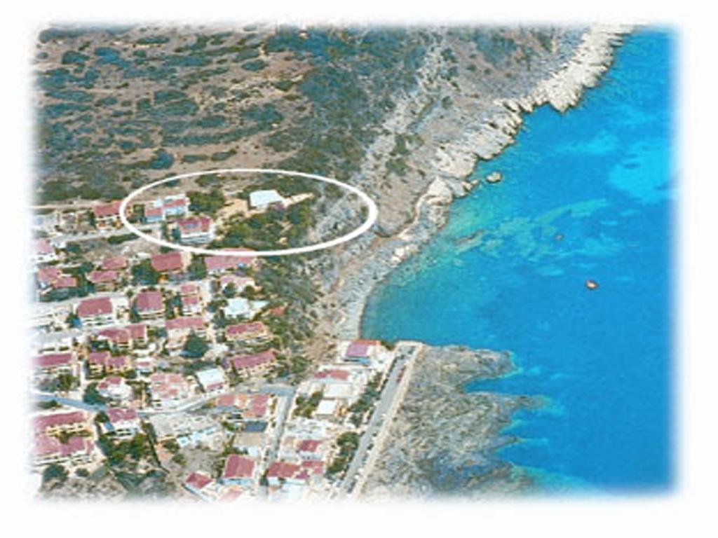 Hotel L'Oasi Кала Гононе Екстериор снимка